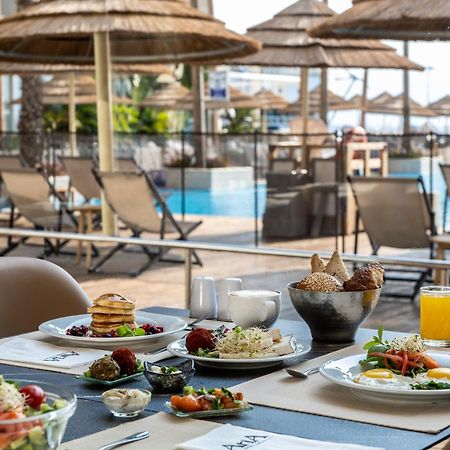 Hotel Aria Eilat Exterior foto A buffet at a hotel